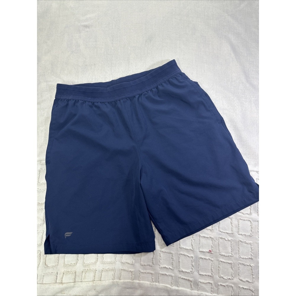 Fabletics Womens Navy Blue Athletic Training Running Shorts Size S Pockets 7in